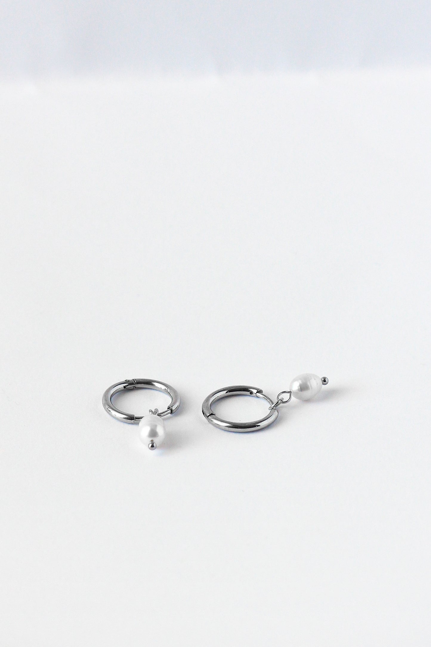 Drop Pearl Huggies- Silver